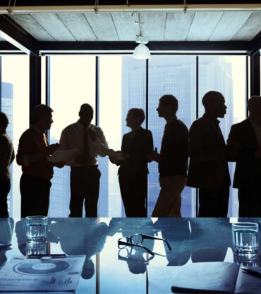 Group of Business Talking in a Meeting